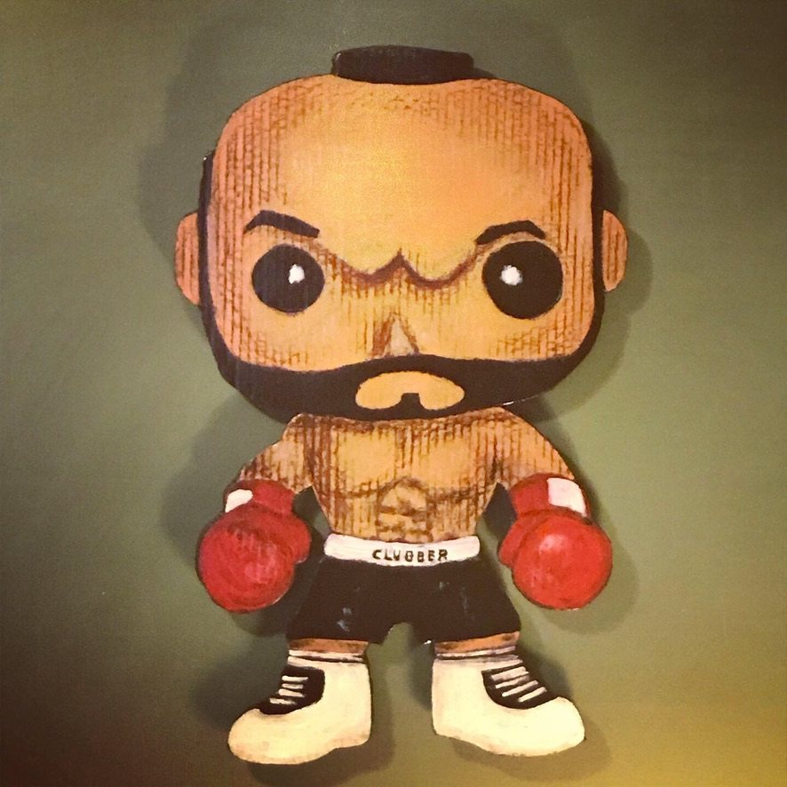 Hand-cut and hand-painted Funko Pop style boxer in red gloves and black trunks lettered Clubber, on a green wall