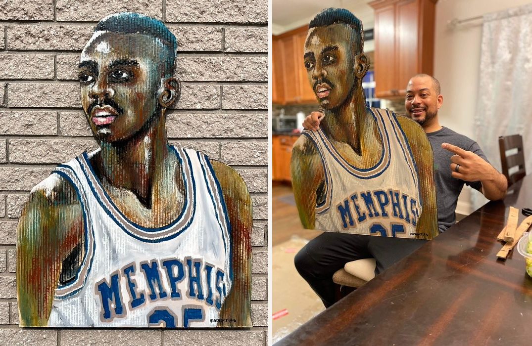 Hand-cut and hand-painted portrait of Memphis basketball player Penny Hardaway, number 25, in a white and blue jersey: on a brick wall, and held by a smiling customer in a kitchen