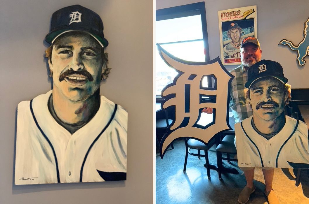 Hand-cut and hand-painted portrait of mustached Detroit Tigers player Kirk Gibson in a navy D cap and white pinstripe jersey: on a gray wall, and held by a customer in a bar beside a giant Old English D piece